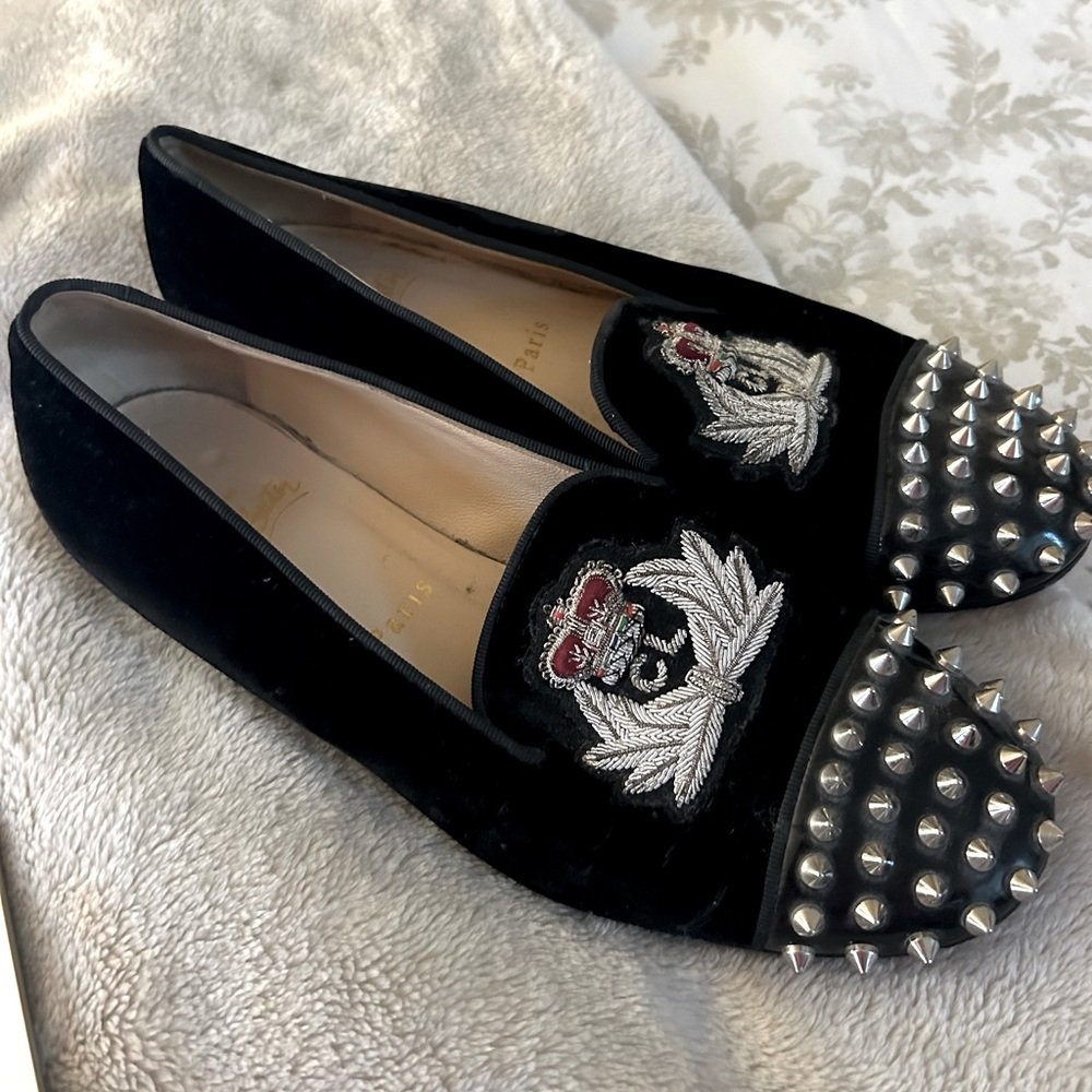 Christian Louboutin spike loafers. Red bottom sole protection.